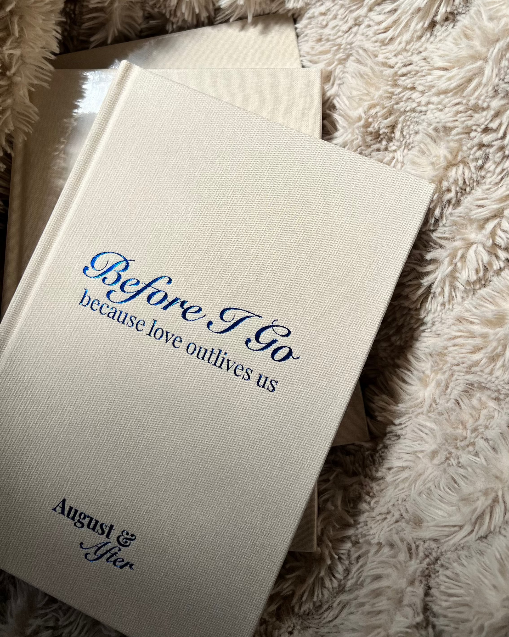 Journal titled 'Before I Go' by August & After on a linen fabric surface